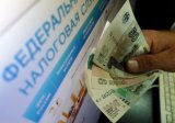 Путін закликав звільнити росіян від простроченої податкової заборгованості