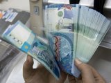 До яких країн переводять найбільше грошей з Казахстану