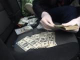 Співробітників Укрексімбанку затримали на хабарі в 1,5 млн грн