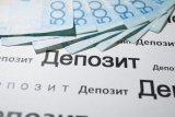 Большинство казахстанцев хранят депозиты в тенге