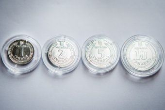 Гривня зміцнилась на закритті міжбанку