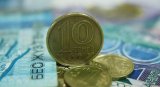 Тенге відреагував на збиткове управління Нацфонд