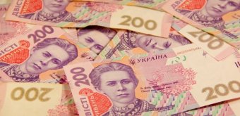 В Україні зросли ставки за депозитами в доларах і гривні та впали в євро