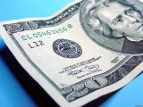 НБУ 9 декабря покупал доллары по 23 грн.