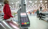 Владельцы карт смогут снимать деньги в кассах магазинов, Россия