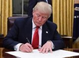Trump Signs U.S. Defense Budget for 2019
