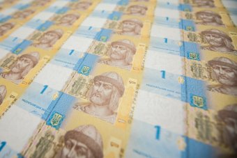 Гривня ослабла на закрытие межбанке