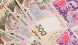 НБУ на 18 октября укрепил курс гривны до 26,48 грн/доллар