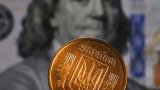 Гривня на міжбанку опустилася нижче 28 за долар