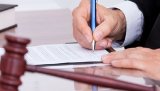 Суд відправив під домашній арешт підозрюваного в отриманні $15 тис. хабара прокурора ГПУ