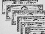 Гривня на межбанке укрепилась до 27,03 за доллар