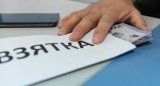 Посадовець вимагав хабар у підприємця за вирішення земельного питання