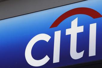 Чистая прибыль корпорации Citigroup в 2014 г. снизилась в 1,9 раза