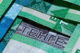 Перевод тенге на латиницу будет постепенным